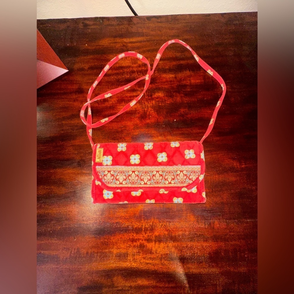 MAGGIB crossbody wallet/bag perfect for travels 
Red and yellow